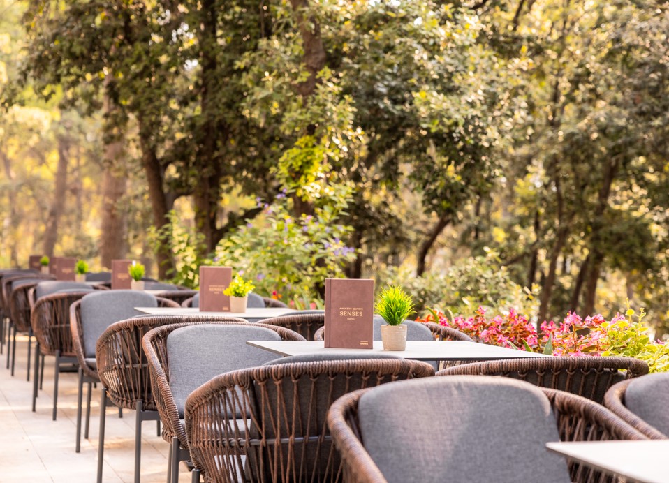 Tables in a row on the terrace of Noir Bar, Aminess Younique Senses Resort Hotel