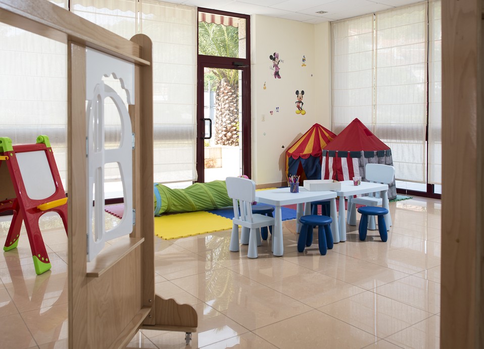 A cozy and vibrant indoor playroom featuring colorful furniture, toys, and child-friendly decor designed to entertain young guests at the Maradiso Marko Polo by Aminess.
