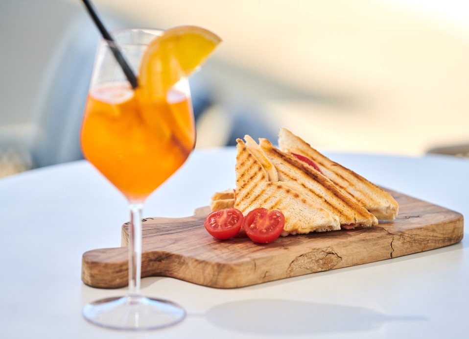 Club sandwich and a aperol spritz at Piano's bar terrace near Aminess Maradiso Casa Bellevue.