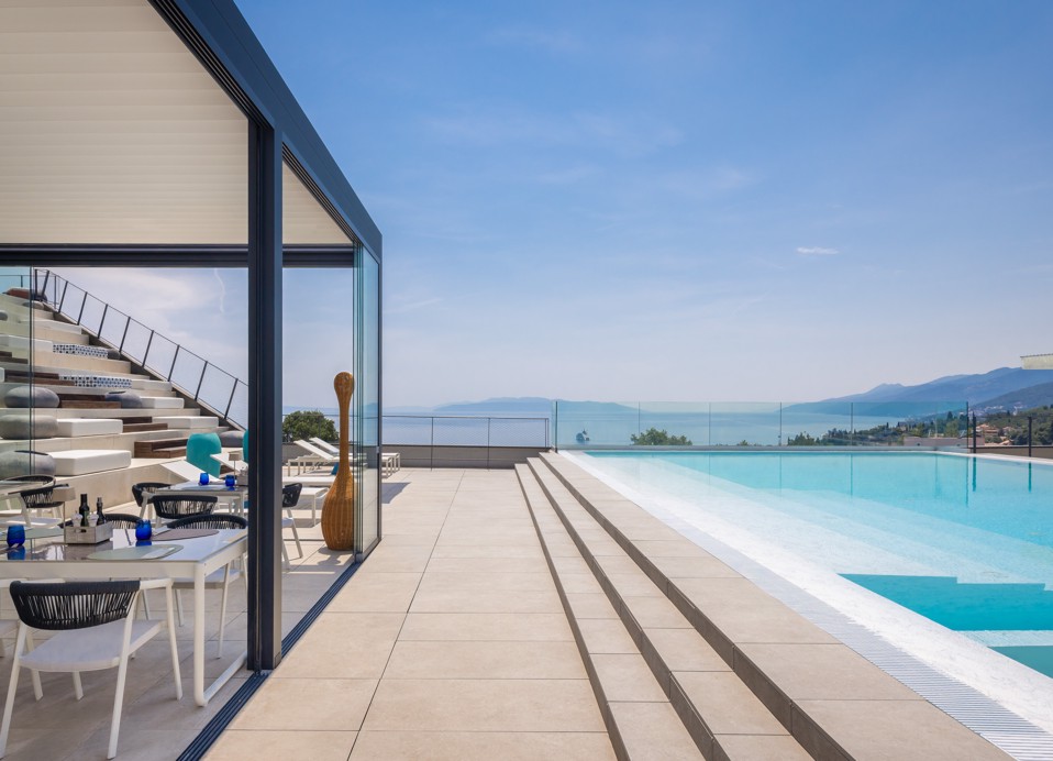 Pool terrace at Younique Vollo Hotel Residences by Aminess with a sea view.