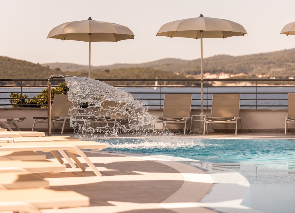 Pool night view featuring a sea view near Aminess Maradiso Bellevue Village.
