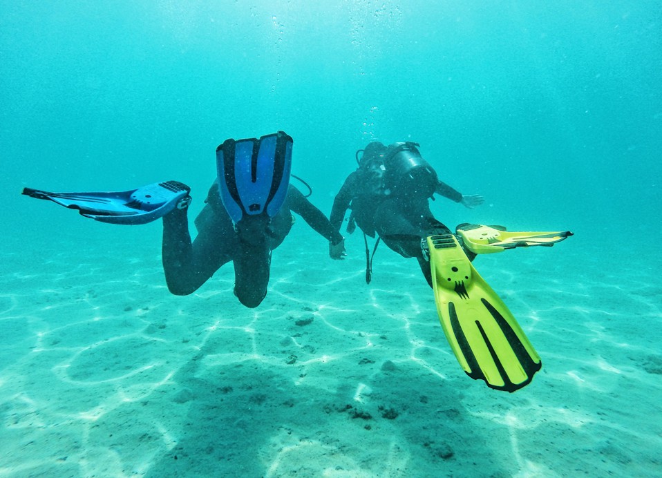 Scuba diving in crystal-clear sea near Aminess Velaris Resort on Brač