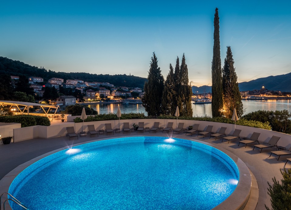Liburna Hotel pool area in the evening setting