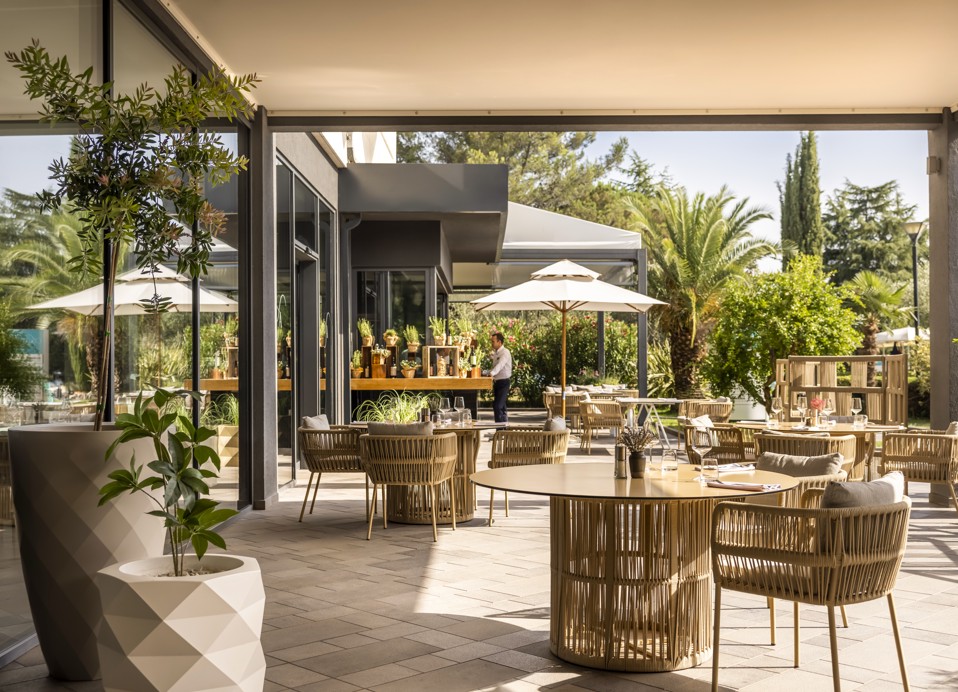 Oliveto terrace outdoor dining at Aminess Planet Camping Sirena, Novigrad, Croatia