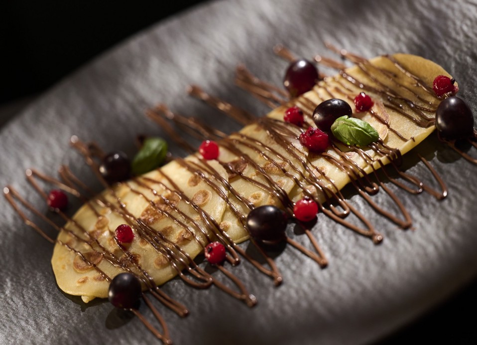 Crepes with chocolate and berries at Aminess Kadoor Hotel.