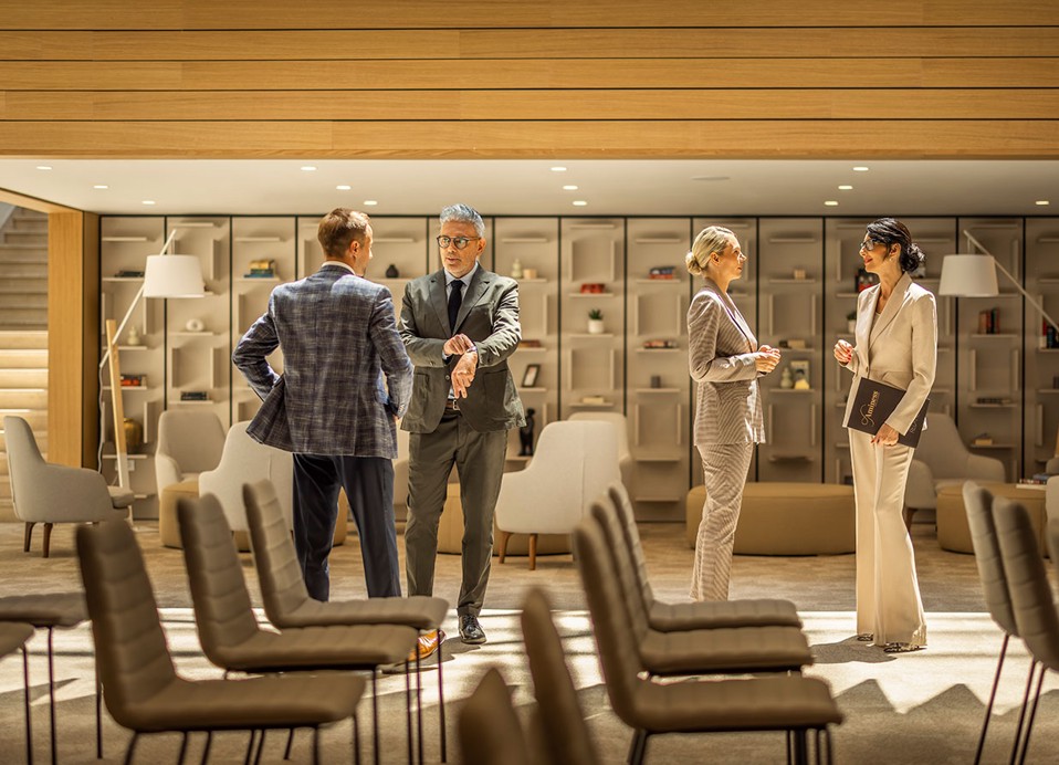 Bussiness people are talking in a convention hall at Aminess Laurel Khalani hotel in Makarska.