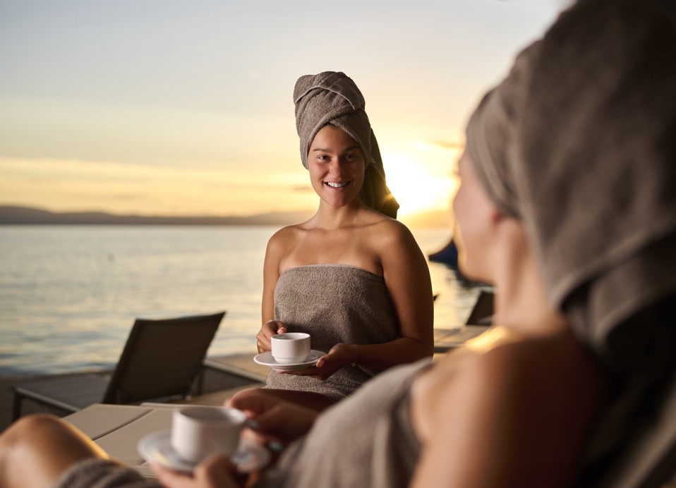 Relaxing terrace experience at Aminess Style Camping Atea Resort with a beautiful sunset view.