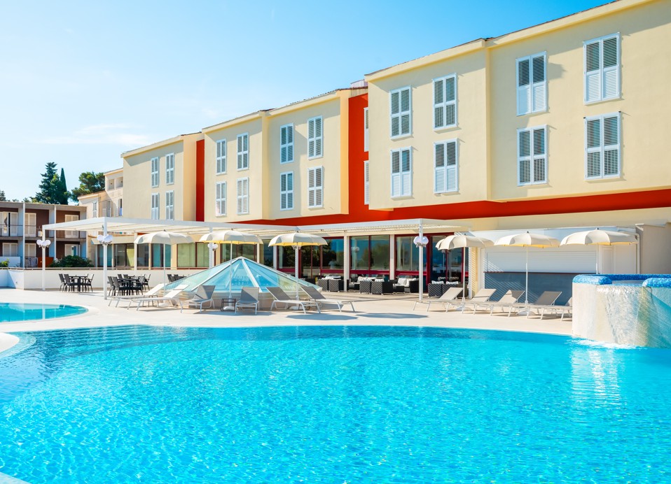 Swimming pool in front of Marko Polo Maradiso Hotel by Aminess, the perfect spot for refreshment and relaxation during your stay.