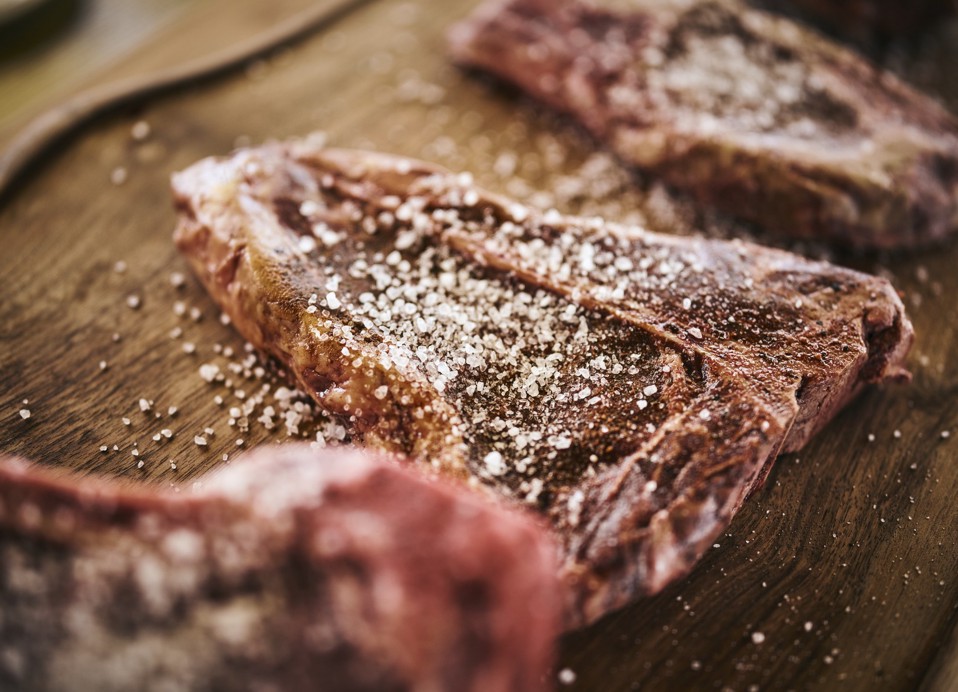 Steaks sprinkled with coarse salt at Kadoor Restaurant in Karlovac.