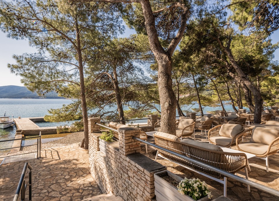 View from the terrace bar at Aminess Younique Senses Resort on Hvar Island overlooking the sea and pier