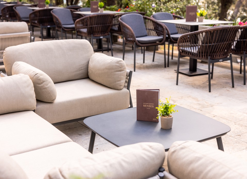 Elegant and cozy armchairs at Noir Bar for evening enjoyment, Aminess Younique Senses Resort