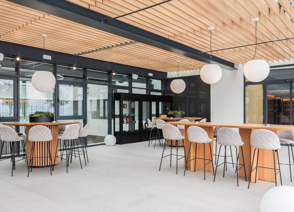 Tables in front of the restaurant at Aminess Laurel Khalani hotel.