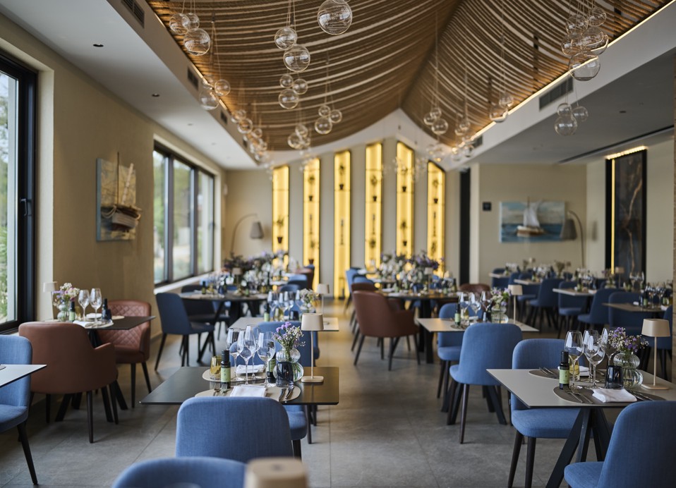 Elegant interior of 7 Seas Restaurant & Bar near Magal Maradiso Hotel by Aminess.