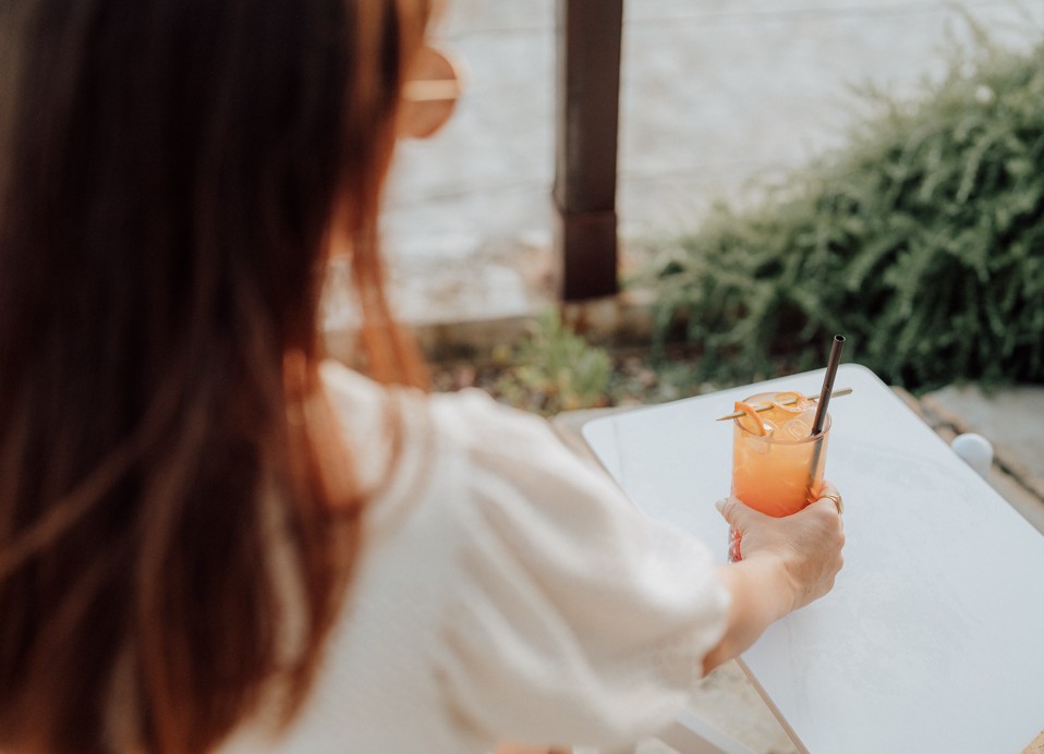 Oleandar bar cocktails being served to a woman at Aminess Planet Camping Sirena, Novigrad, Croatia