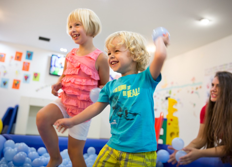 Kids enjoying kid playroom at Aminess Vival Grand Azur Hotel .