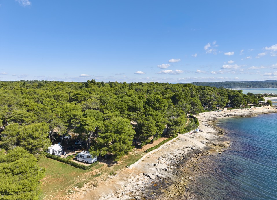 Panoramic view of the beach and sea at Aminess Planet Camping Sirena Holiday Homes in Novigrad, featuring crystal-clear water and a perfect spot for relaxation