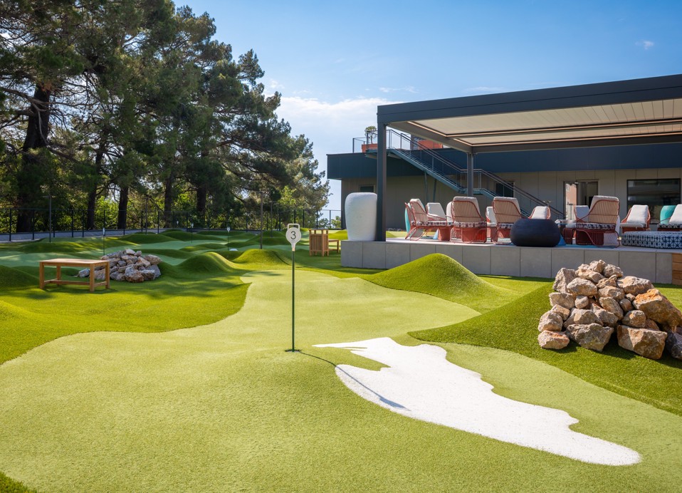 Mini golf course beside the lounge terrace at Aminess Younique Vollo Hotel Residences